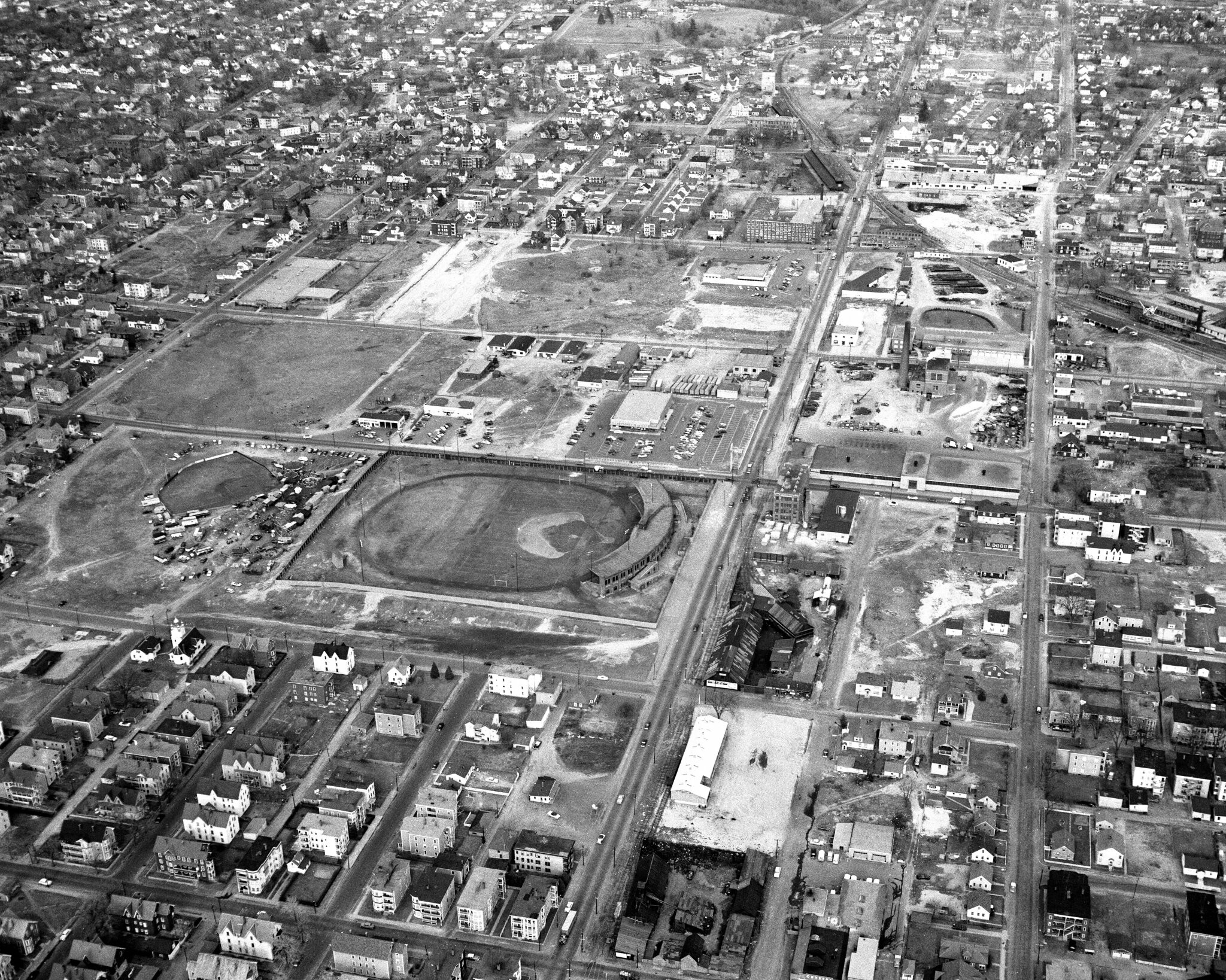 Aerial view of Gill Stadium looking east towards Hallsville circa 1957