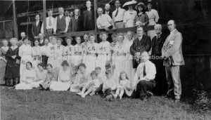 Group Portrait—Manchester High School 25th Reunion Class of 1889-90 [taken 8 September 1915]. G. I. Hopkins; Arthur Wheat; Tommy Morse; Mattie Chadwick (Hobbs); Ellen Brown; May Morse; Grace Smith; Cora Simmons; Bertha Young; Ethel Lauiprey; [Vennie] Bartlett; [Mertie] Hawkes (Preston); Sarah Price; Hattie Willard; May (Saxon); William Heath; Dick Hobbs; Will Saxon; [Norwise] Bean; Mrs. Bean; Margaret Manning; Mrs. Fay S. Manning; Edith Burnhaus; with other husbands and children of classmates. From the Manchester Historic Association Collection. Used with permission. 