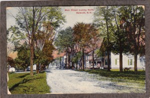 An old postcard showing the view of Benton NH's main street.