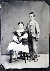 Tintype photograph of siblings Gardner and Georgianna Wyman.