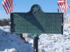 Photograph of Gerald R. Helmich recognition plaque, located in Manchester NH at the corners of Second and West Hancock Streets. Copyright of Martin Miccio for the City of Manchester, and used here with permission.