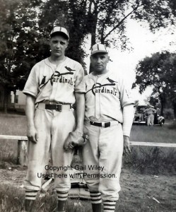 Son and Father: Robert "Curly" Clement with his father Fred Clement, both of the Manchester [NH] Cardinals baseball team. Curly was a first baseman and Fred was the team manager in 1938 when this photograph was taken.