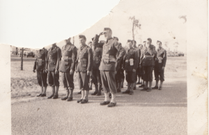 Last photograph I promise. Found with same group. Seems to be World War 1 or possibly Spanish-American. Back says "Waiting for [cut off] on Parade Ground [cut off] the sun. "